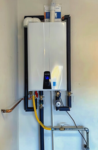 https://mosmanparkhotwater.com.au/uploads/2025/06/instant-hot-water-systems-63860.jpg